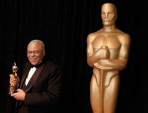 James Earl Jones poses with his honorary Oscar at the 84th Academy Awards on Sunday, Feb. 26, 2012, in the Hollywood section of Los Angeles. Jones, who overcame racial prejudice and a severe stutter to become a celebrated icon of stage and screen has died at age 93, Monday, Sept. 9, 2024. (AP Photo/Chris Carlson, File).