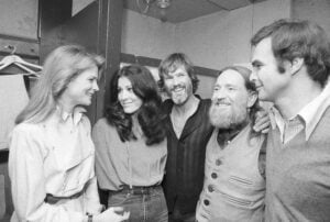 Actress Candice Bergen, from left, singer Rita Coolidge, singer/songwriter Kris Kristofferson, country singer Willie Nelson, and actor Burt Reynolds are seen backstage at New York's Bottom Line after Coolidge and Kristofferson's opening night, Jan. 4, 1979. Kristofferson, a Rhodes scholar who became a superstar songwriter, singer and actor, died Saturday, Sept. 28, 2024. (AP Photo/Richard Drew, File).