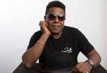 Tito Jackson, a member of the famed Jackson 5, poses for a portrait in Los Angeles, July 24, 2019, to promote his solo project, a new version of his 2017 song "One Way Street." (Photo by Mark Von Holden/Invision/AP, File).