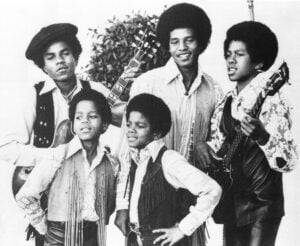 The Jackson 5, Michael Jackson, front right; Marlon Jackson, front left; Tito Jackson, back left; Jackie Jackson, back center; and Jermaine Jackson, back right; pose for this undated photo together in Los Angeles. (AP Photo, File).