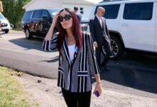 Laura Loomer arrives with Republican presidential nominee former President Donald Trump for a visit to the Shanksville Volunteer Fire Company in Shanksville, Pa., Wednesday, Sept. 11, 2024. (AP Photo/Matt Rourke).