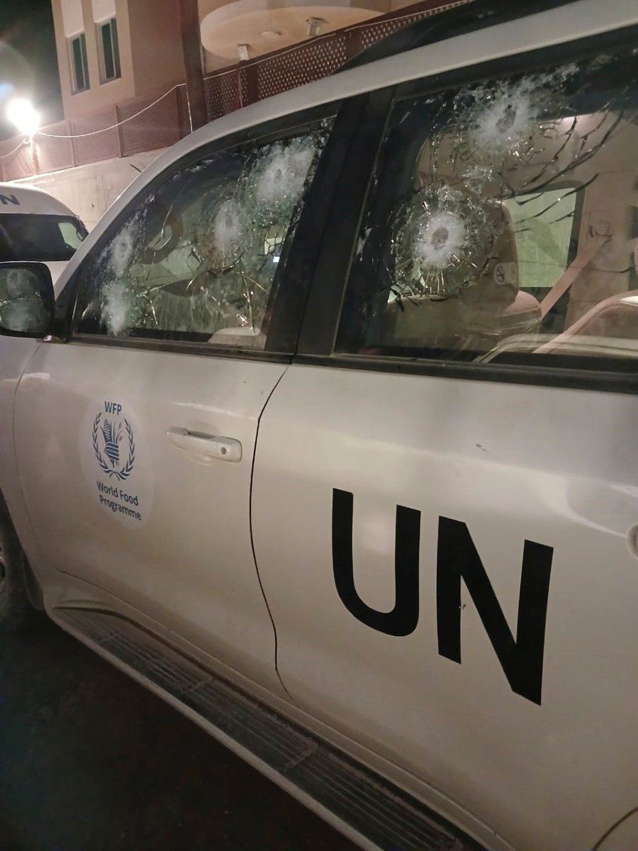 This picture made available by the World Food Programme (WFP) in Rome on Thursday, Aug. 29, 2024, shows the WFP car that went under fire in the evening of Wednesday, Aug. 28, a few metres from an Israeli check point at the Wadi Gaza bridge. The U.N. food agency said Wednesday it is "pausing" the movement of all staff in Gaza until further notice after one of its clearly marked vehicles was hit by at least 10 bullets as it was moving toward an Israeli military checkpoint at the Wadi Gaza bridge in the center of the territory. (World Food Programme via AP, ho).