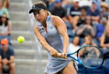 Yulia Putintseva, of Kazakhstan, returns a shot to Jasmine Paolini, of Italy, during the third round of the U.S. Open tennis championships, Saturday, Aug. 31, 2024, in New York. (AP Photo/Kirsty Wigglesworth).