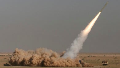 In this photo released by the Iranian semi-official Fars News Agency, Revolutionary Guard's Fateh missile is launched in a drill near the city of Qom, 80 miles (130 kilometers) south of the capital Tehran, Iran, Sept. 27, 2009. (Ali Shaigan/Fars News Agency via AP File).