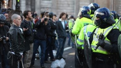 A 16-year-old girl, caught on video giving a Nazi salute and drinking vodka during riots in Plymouth, claims ignorance of the symbol's meaning.