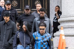 Sean "Diddy" Combs' sons Quincy Brown, left, Justin Dior Combs, right, King Combs, center, leave Manhattan federal court in New York, Sept. 18 2024. (AP Photo/Stefan Jeremiah, File).