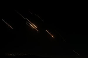 Missiles launched from Iran towards Israel are seen in the West Bank city of Nablus Tuesday, Oct. 1, 2024. (AP Photo/Majdi Mohammed).