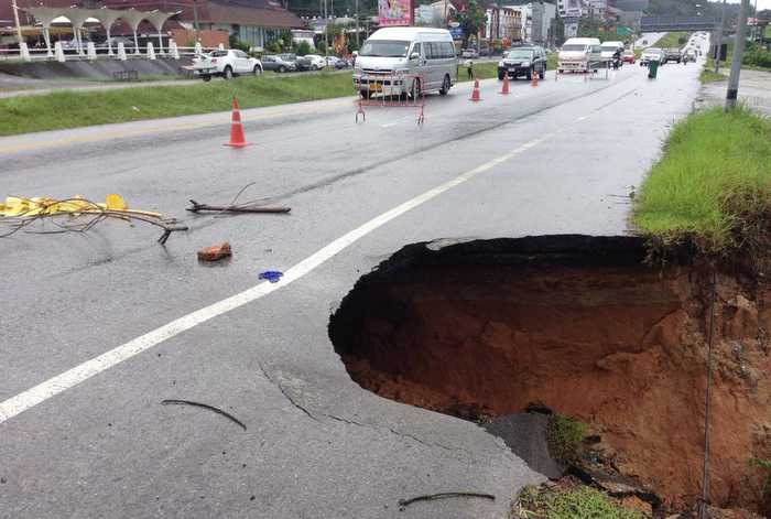 Phuket downpours leave sinkhole, landslip across roads