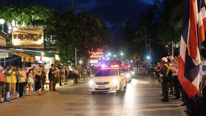 Phuket police parade down Soi Bangla to promote high season, public safety