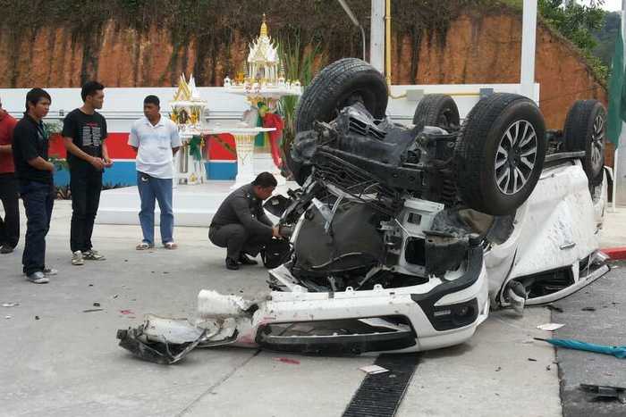 Pickup truck crash at gas station leaves one dead, one injured.