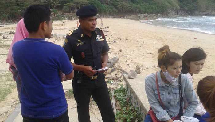 Waves drag musician from iconic Phuket cape, search efforts postponed