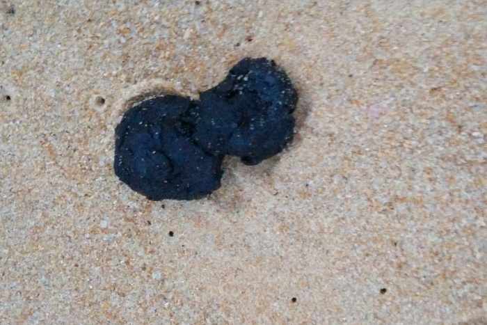 Beachgoer baffled by black substance on Phuket beach