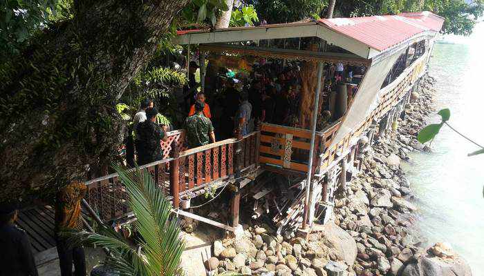 Military bulldozes Phuket beach structure, owners to face charges