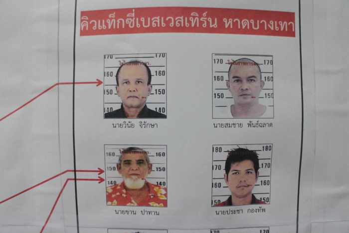 Scores of alleged Phuket mafia taxi drivers shuffle into court