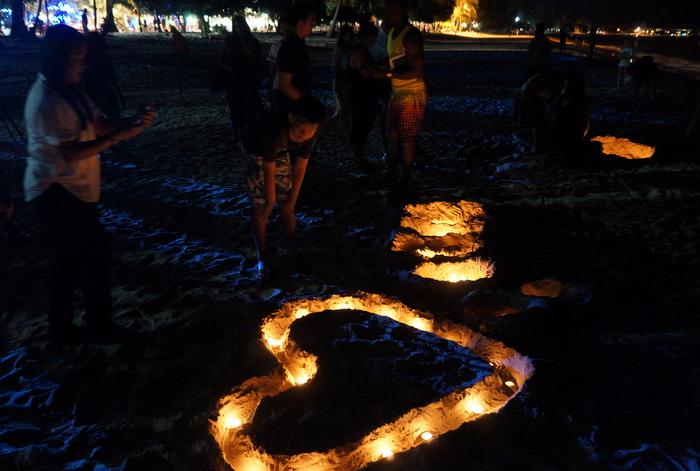 Only flicker of light at Phuket tsunami memorial ceremony