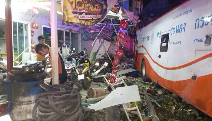 Phuket Chinese New Year tour bus slams into motorcyclists, houses