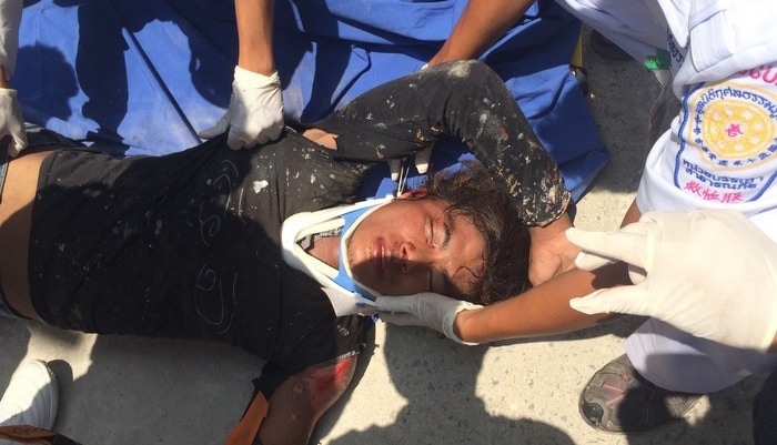 Shocked Myanmar worker falls from scaffolding