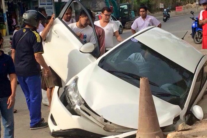 Chinese tourists safe as car slams into Patong drain