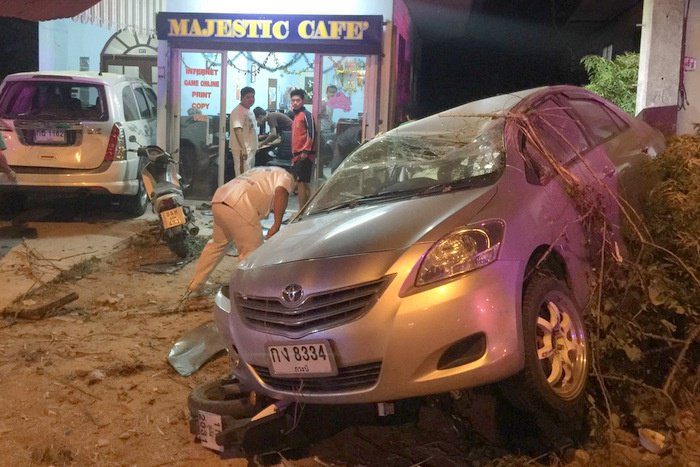 Phuket gamers spared as car slams shopfront power pole