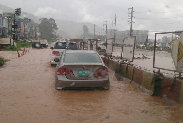 Heavy rain floods underpass construction site