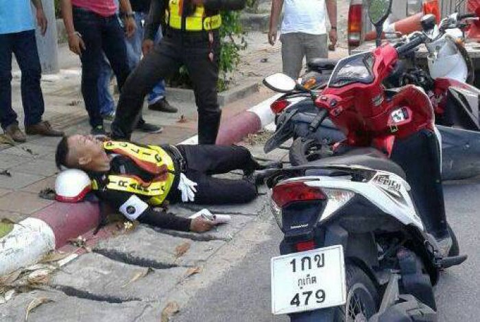 Chinese tourist runs over Phuket traffic cop