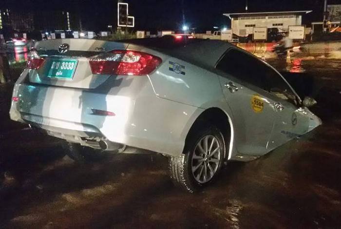 Phuket underpass construction site gobbles up taxi