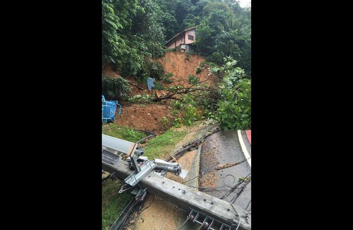 Traffic choked up as landslide fells utility poles, trees