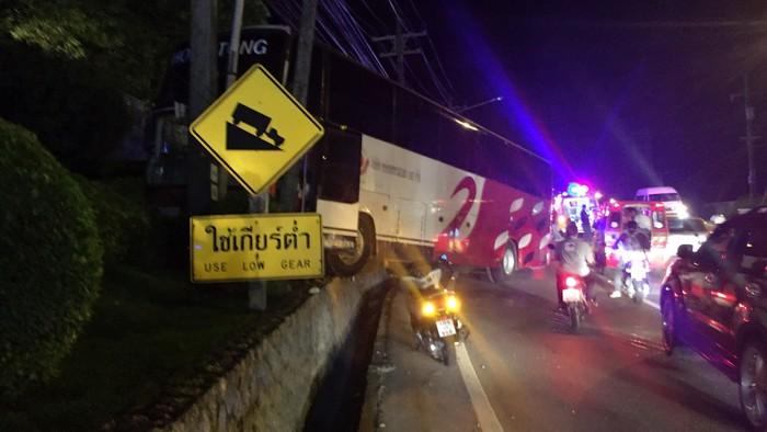 Motorcyclists injured in coach collision on Patong Hill