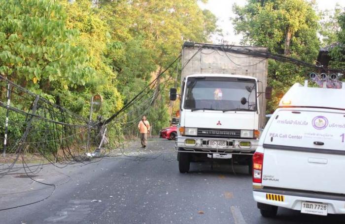 Delivery truck downs power lines, throws rider over wall