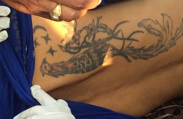 Police hope peacock tattoo leads to identification of body