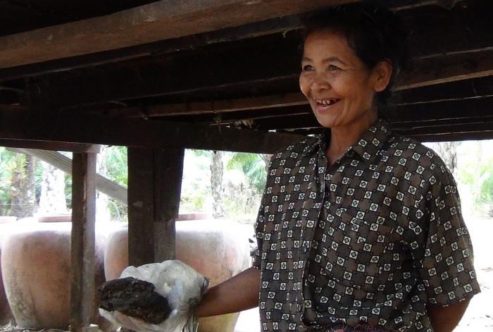 Krabi locals pay respect to metal cow pat