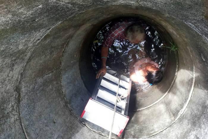 Woman upset with daughter jumps down a well