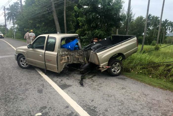 Pick-up slams into pole, splits in half