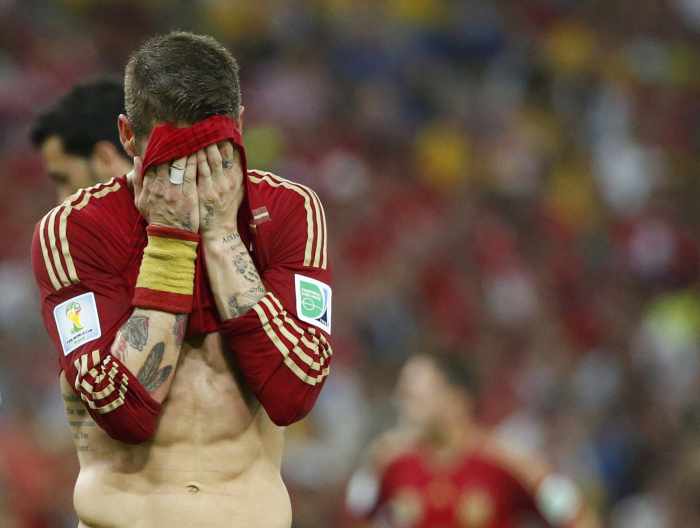 Champions Spain crash out of World Cup