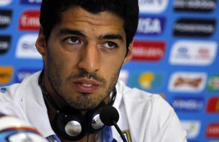 World Cup over for Suarez after record ban for biting