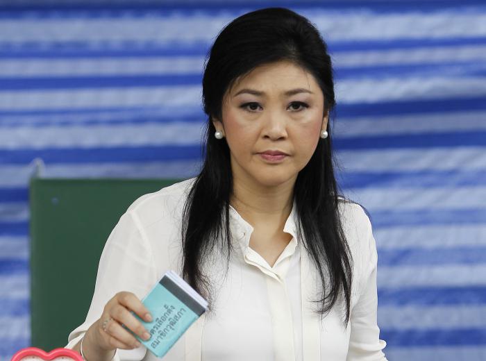 Yingluck offers to quit; Park chief probe over missing activist; Four dead from swine flu