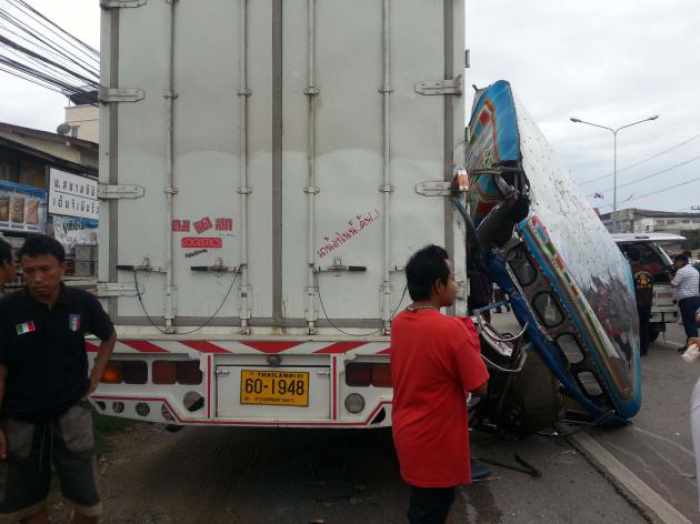 Boy, 9, killed and 14 hurt as packed songthaew crashes