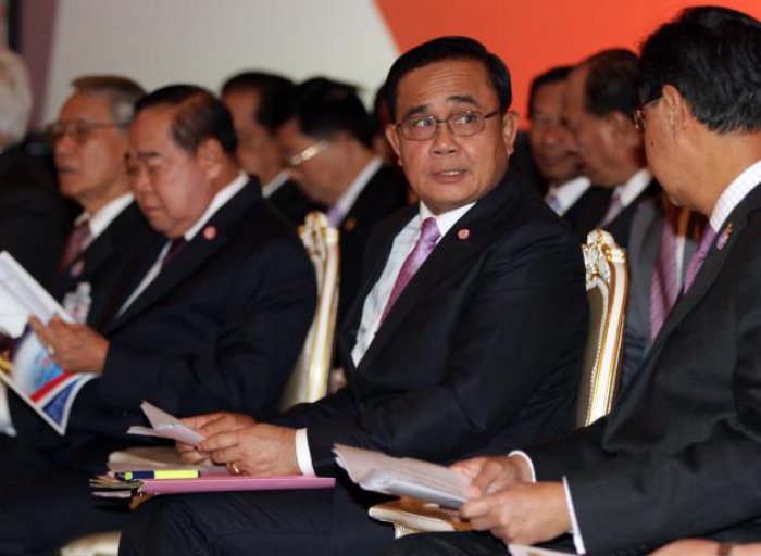 Prayut takes swipe at media in six-month progress report