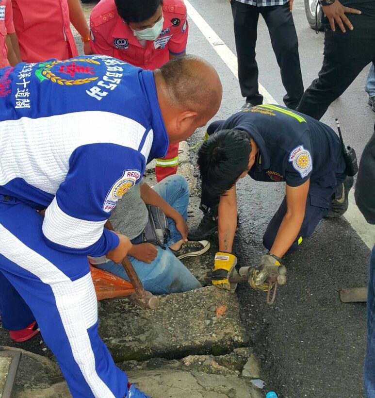 Don’t walk and talk. Woman gets stuck in drain.