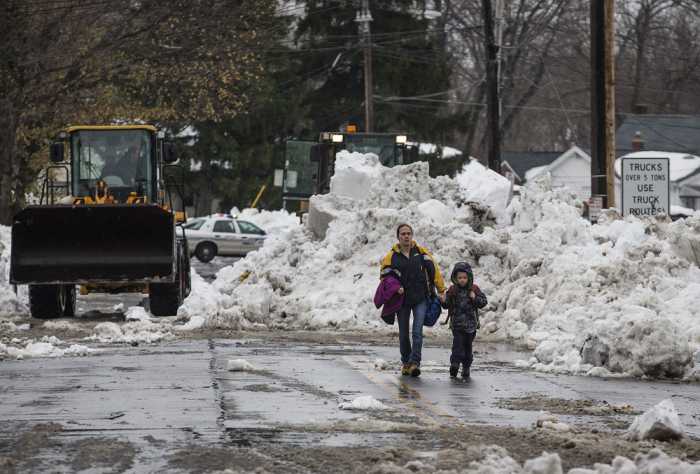 After fierce snowstorms, New York braces for floods