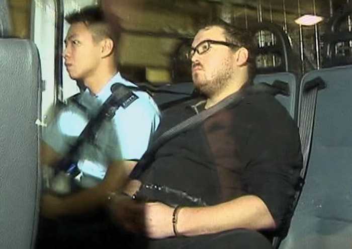 British banker charged with Hong Kong murders