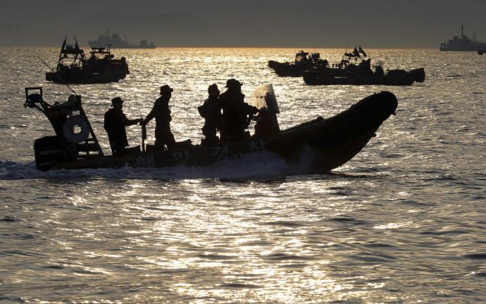 Body of Korean boy who raised alarm on sinking ferry believed found