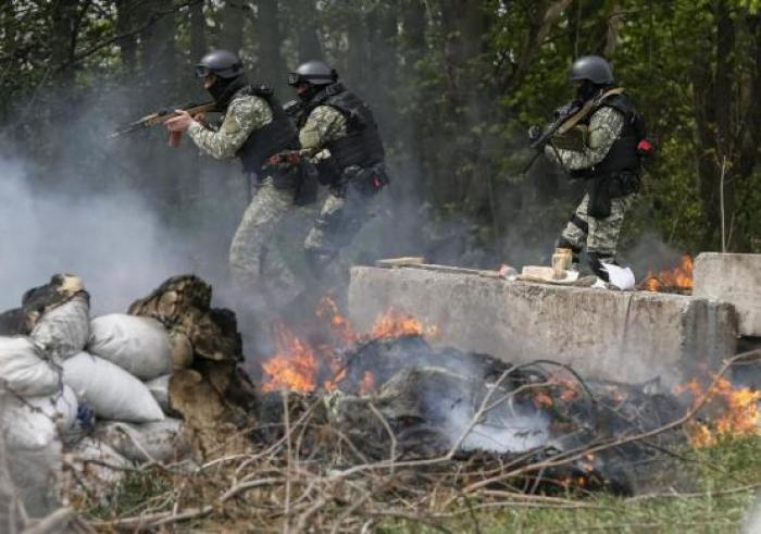 Ukraine forces kill up to five rebels; Russia starts drill near border