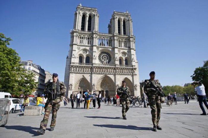 Paris church attack foiled as heavily armed man shoots self