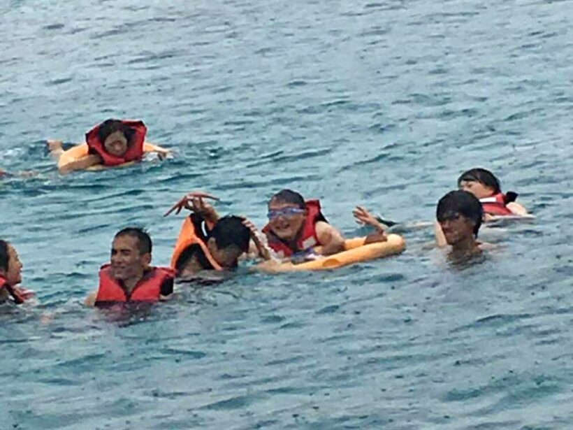 Starfish collectors on Koh Racha Yai off Phuket