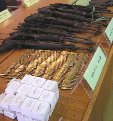 Arms cache seized in Trang