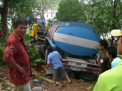 Woman killed in water truck crash