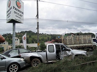 Phuket crash uproots tree, two slightly injured