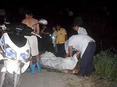 Phuket man murdered within inches of his wife