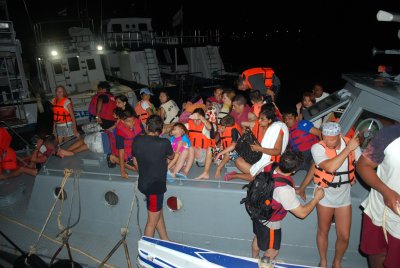 Stranded Phi Phi tourists towed to Phuket safety